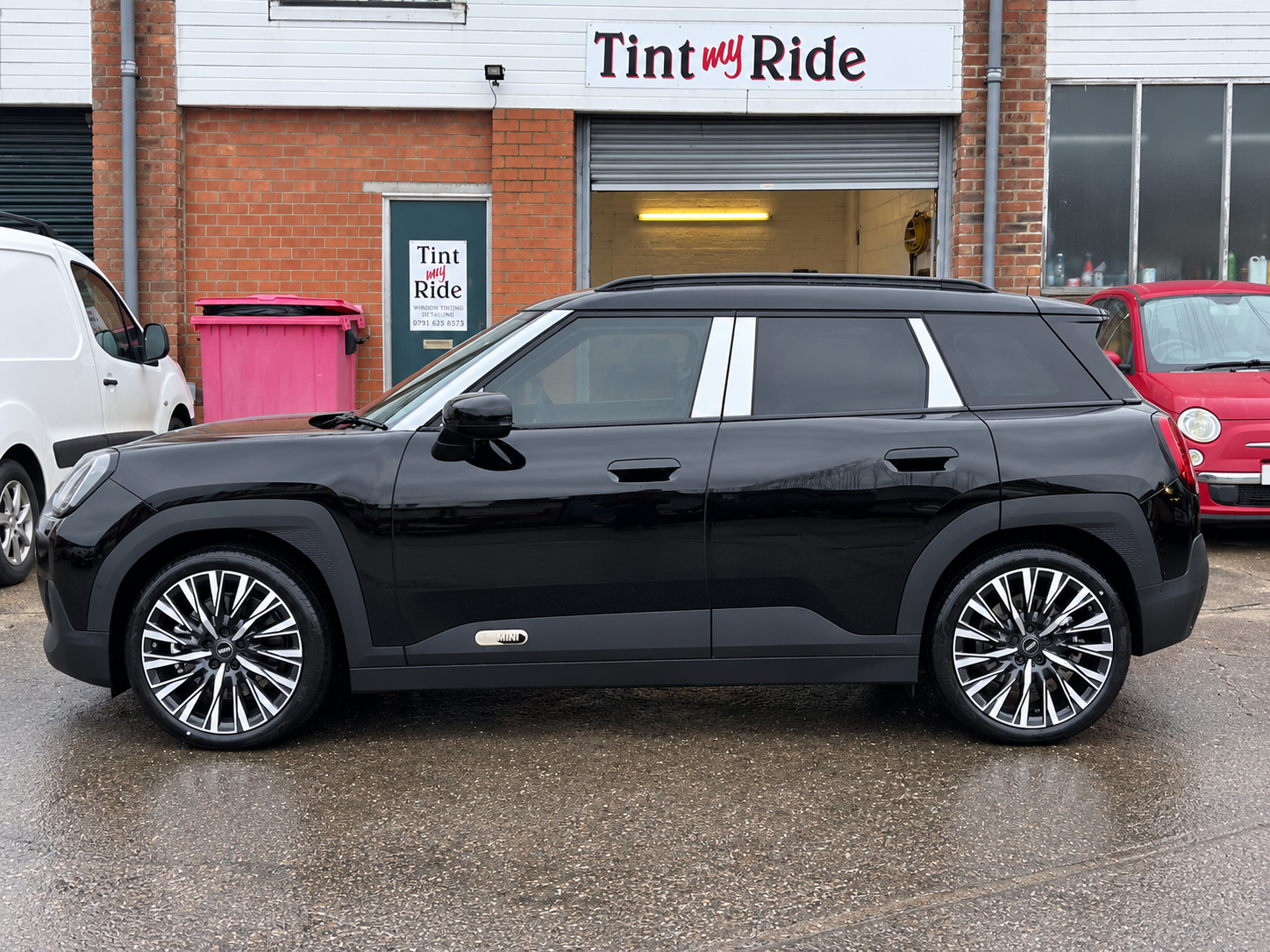 Black Range Rover with rear privacy tint